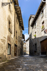 Fototapeta na wymiar Empty street of medieval spanish village Rupit, old stone street in Catalonia, Spain