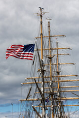 the american flag in the wind on an US Coastgard sailing ship in Reykjavik, Iceland