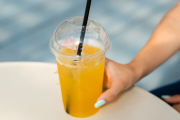 summer drink refreshing lemonade on the table in a beach cafe