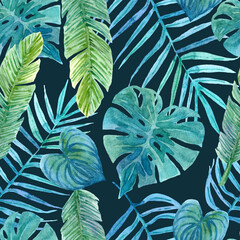 Seamless pattern with lush greenery of tropical plants.
