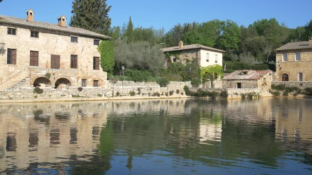 Geothermal pool and hot spring in Tuscany, Italy. Bagno Vignoni thermal pond in the morning with no people.