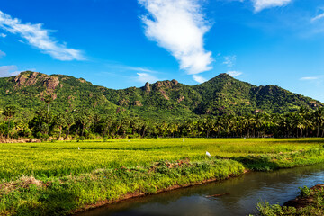 Fototapeta na wymiar Beautiful landscape with mountain and blue sky background in Nagercoil. Tamil Nadu, South India.