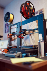 Modern 3D printers on table