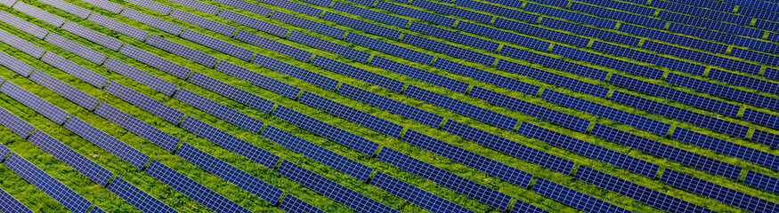 Ecology solar power station panels in the fields green energy at sunset landscape electrical...