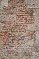old antique wall made of brickstone in french castle near Auxonne