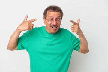 Naklejka premium Middle aged indian man isolated on white background showing a disappointment gesture with forefinger.