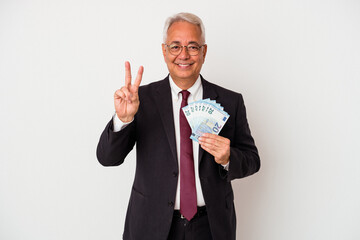 Senior american business man holding bills isolated on white background showing number two with fingers.