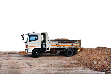 Dump truck unloading process on construction site, isolated on white background.