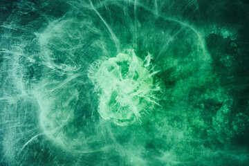Abstract green color background. Swirling vibrant hookah smoke, underwater emerald ocean, dynamic paint in water