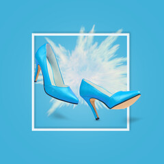 Blue high heels  with white powder explosion on a blue background.