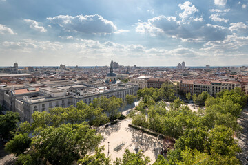 Panoramic view of the noble area of the city of Madrid with a beautiful wooded park in the foreground