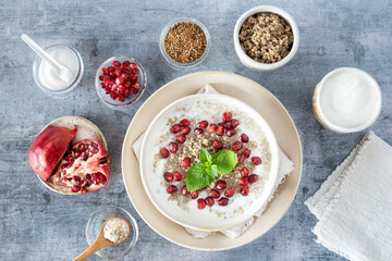 Close-up of a bowl of millet semolina with pomegranate seeds