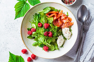 Summer salad with salted salmon, ricotta and raspberries.
