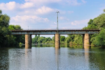 Fototapeta premium Soldatenbrücke bridge crossing Ems river close to the city of Rheine in Germany