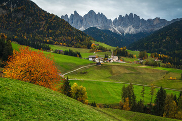 Fantastic alpine autumn scenery with Santa Maddalena village, Dolomites, Italy
