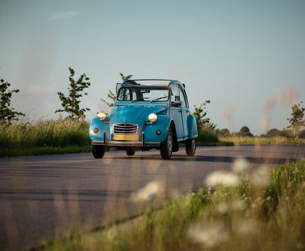 ZOETERMEER, NETHERLANDS - Jul 15, 2021: Blue Citroen 2CV (Deux Chevaux) classic car on the road