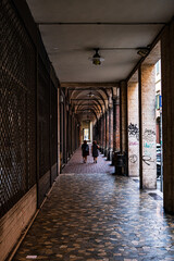 Fototapeta premium Porticoes of Bologna by day. Arches, columns, architecture. Italy