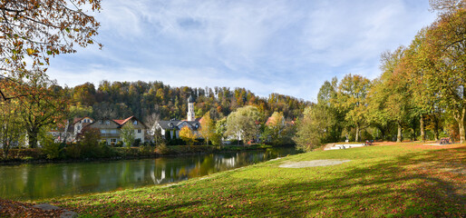 Fototapeta na wymiar Loisach riverside park, autumnal scenery Wolfratshausen tourist resort