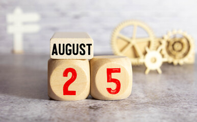 August 25 - from wooden blocks with letters, important date concept, white background random...