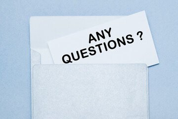 text ANY QUESTIONS. envelope, A LEAFLET WITH WRITTEN TEXT.text time to plan