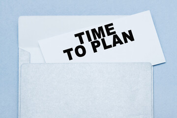 text time to plan. envelope, A LEAFLET WITH WRITTEN TEXT.text time to plan