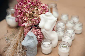 Scented curly candles in form of Goddess venus large female body and male torso