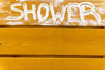 background from wooden horizontal planks of natural color with the inscription 