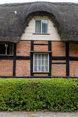 thatched cottage in the village, uk Shropshire, Brampton Bryan