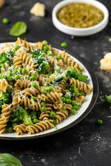Green peas, broccoli pasta with pesto sauce and parmesan cheese. healthy food.