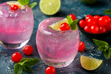 Cherry Limeade or Lemonade in drinking glass. Refreshing summer drink.