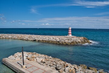 different views of the lighthouse of the port closest to Catalina Island in Dominican Republic