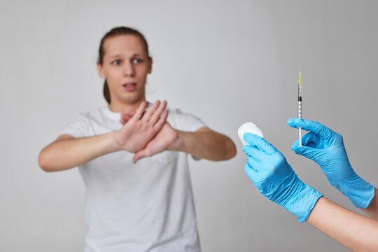Scary man during coronavirus vaccination, covid-19 immunization.