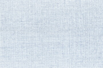 The texture of a natural simple fabric of a light shade. Simple background. Burlap.