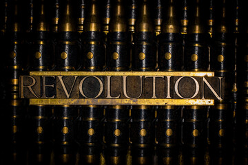 Revolution text message on copper bullet casings