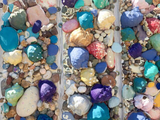 Coloring snail shells and stones and making decorations.