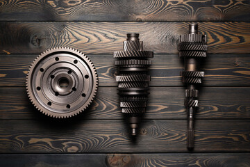 Disassembled parts of car gearbox flat lay background.