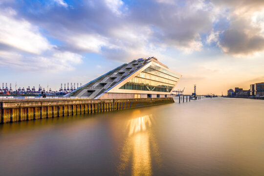 Hamburg, Germany - June 5, 2018: The Dockland building, an office building with a staircase accessible for visitors with a view over the harbor and the northern bank of the river Elbe.