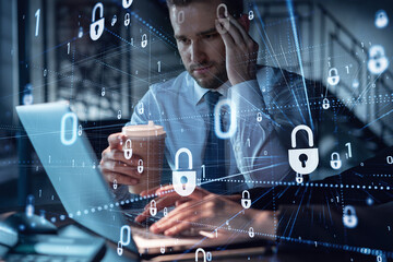 Two colleagues working together to protect clients confidential information and cyber security. IT...