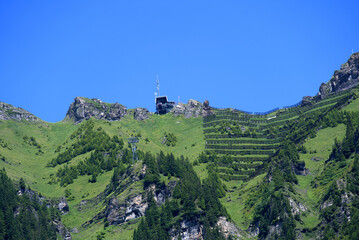 Fototapeta na wymiar Landscape in the mountains at Bernese highland on a beautiful summe day. Photo taken July 20th, 2021, Lauterbrunnen, Switzerland.