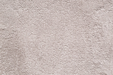 Rough plaster concrete wall for texture and background.