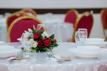 wedding decoration with flower red chairs
