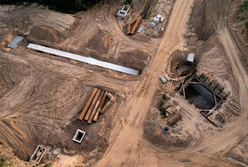 Construction of stormwater pits and sanitary sewer system. Laying of underground storm sewer pipes...