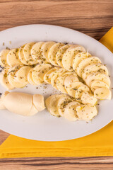 portion of cheese on wooden background