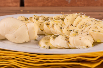 portion of cheese on wooden background