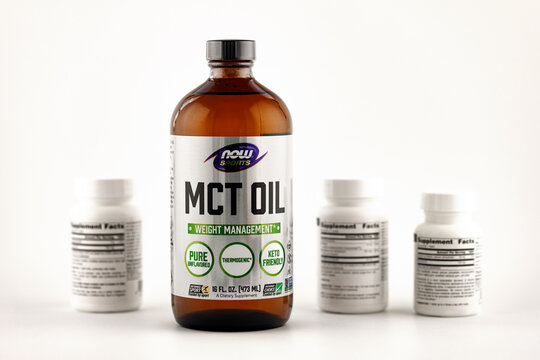 mct oil in the bottle. dietary supplement editorial photo