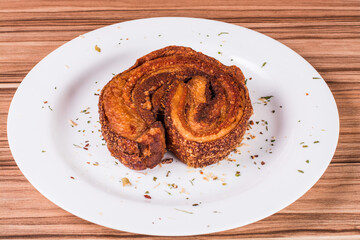 portion of pork cracklings on wooden background