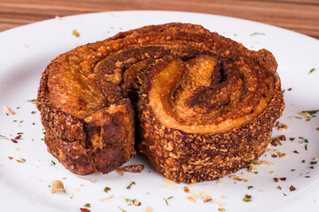 portion of pork cracklings on wooden background