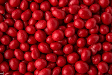 Candies. Glazed hazelnuts or almonds. Desserts for candy bars. Small red dragees.