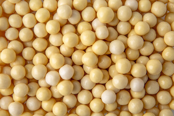 Hazelnuts in white chocolate, dragee. Desserts for Candybar. Small round candies.
