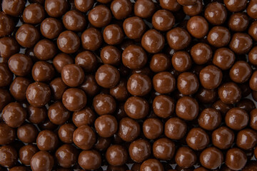 Hazelnuts in milk chocolate, dragee. Desserts for Candybar. Small round candies.